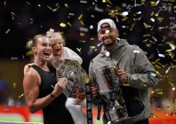 belarus aryna sabalenka her goddaughter nicole and australia s nick kyrgios celebrate with trophies after the battle of the sexes match in dubai photo reuters