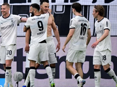 gladbach sink dortmund st pauli edge closer to drop