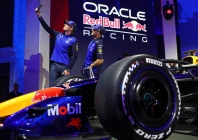 red bull drivers isack hadjar and max verstappen snap a selfie at the unveiling of the team s car for the 2026 formula one season photo afp