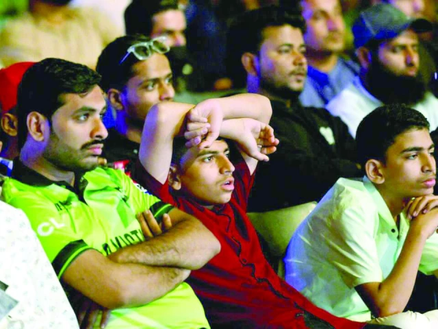 cricket fans in karachi watch a live broadcast of their team lose to india photo afp cricket fans in karachi watch a live broadcast of their team lose to india photo afp