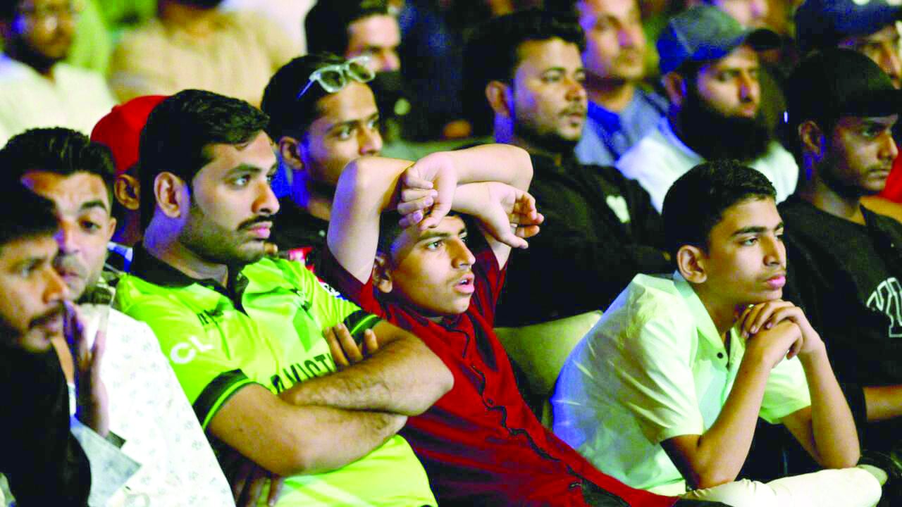 cricket fans in karachi watch a live broadcast of their team lose to india photo afp