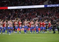 atletico madrid s players applaud at the end of the spanish league football match between club atletico de madrid and athletic club bilbao at the metropolitano stadium in madrid photo afp