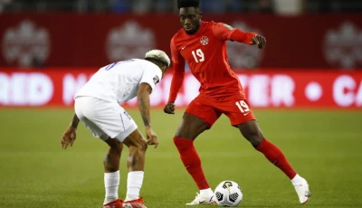 bayern munich star alphonso davies right heads a new generation of players who have lifted canada up the global rankings photo afp
