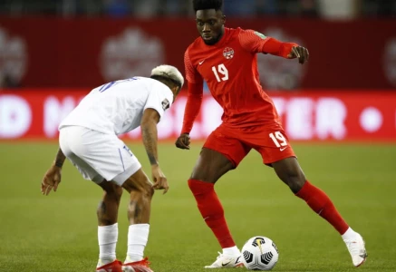 bayern munich star alphonso davies right heads a new generation of players who have lifted canada up the global rankings photo afp