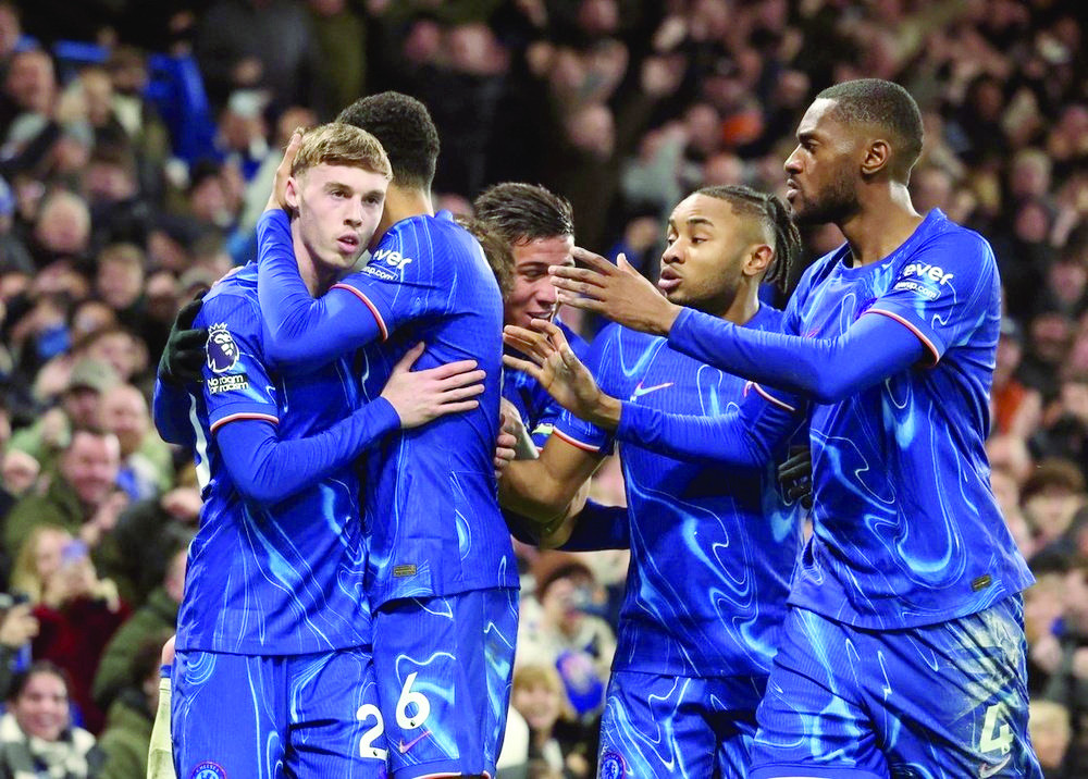 chelsea s cole palmer celebrates after his deflected cross produced the winner against west ham photo afp