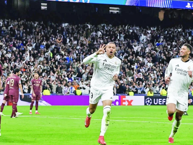 real madrid s kylian mbappe celebrates scoring his hat trick goal against man city photo afp real madrid s kylian mbappe celebrates scoring his hat trick goal against man city photo afp