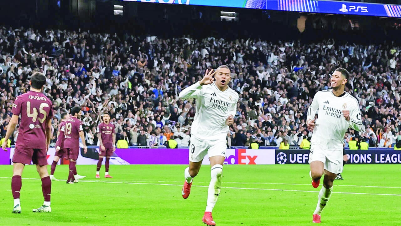 real madrid s kylian mbappe celebrates scoring his hat trick goal against man city photo afp