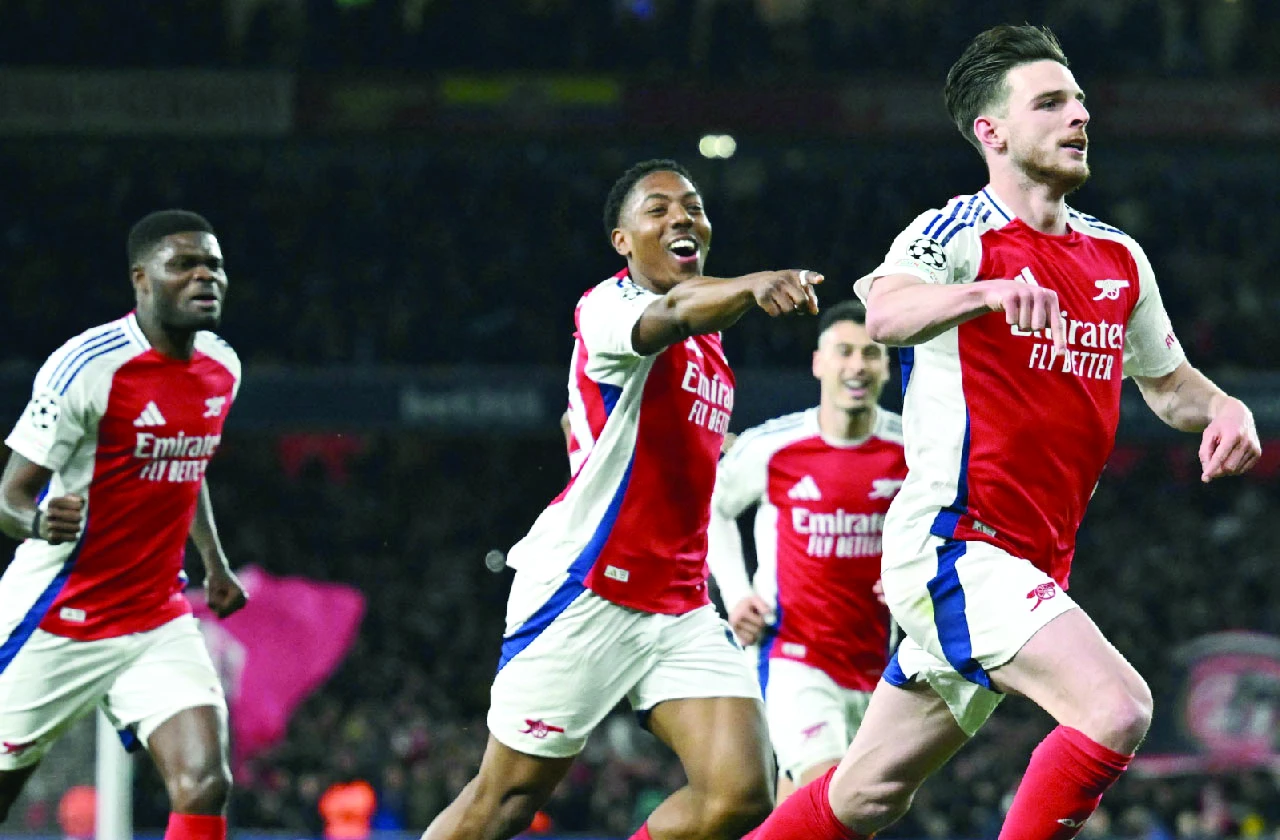 declan rice leads the celebration after scoring a stunning free kick against real madrid in the champions league photo afp declan rice leads the celebration after scoring a stunning free kick against real madrid in the champions league photo afp
