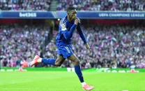 dembele brace fires psg top in france