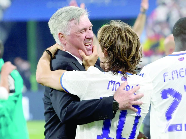 luka modric and carlo ancelotti celebrate real madrid s victory photo afp file luka modric and carlo ancelotti celebrate real madrid s victory photo afp file