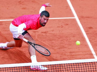 djokovic shines at roland garros opener