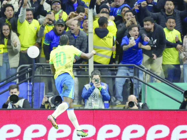 brazil forward vinicius jr celebrates after scoring the goal that fired the five time world champions into next year s world cup finals photo afp brazil forward vinicius jr celebrates after scoring the goal that fired the five time world champions into next year s world cup finals photo afp