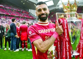 liverpool spend big to hold off arsenal