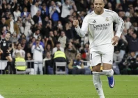 real madrid s french forward kylian mbappe celebrates scoring his team s second goal against sevilla to match cristiano ronaldo s record photo afp