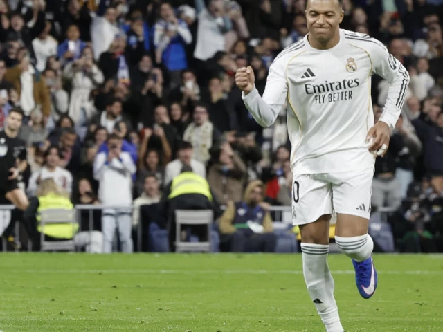 real madrid s french forward kylian mbappe celebrates scoring his team s second goal against sevilla to match cristiano ronaldo s record photo afp real madrid s french forward kylian mbappe celebrates scoring his team s second goal against sevilla to match cristiano ronaldo s record photo afp