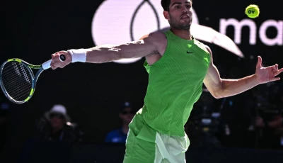 world number one carlos alcaraz hits a return during his win over germany s yannick hanfmann photo afp