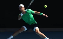 djokovic eases into australian open third round djokovic eases into australian open third round