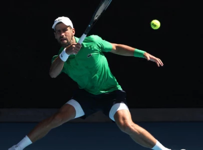 djokovic eases into australian open third round djokovic eases into australian open third round