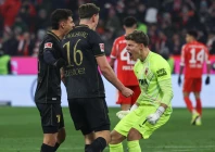 augsburg defender cedric zesiger celebrates victory over bayern with goalkeeper finn dahmen photo afp