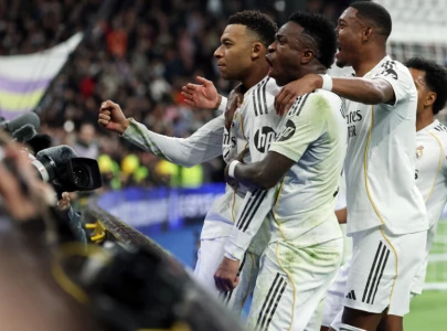 real madrid scrape win over rayo