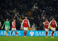 arsenal s william saliba and arsenal s gabriel magalhaes react after wolverhampton wanderers tom edozie scored their second goal photo reuters arsenal s william saliba and arsenal s gabriel magalhaes react after wolverhampton wanderers tom edozie scored their second goal photo reuters