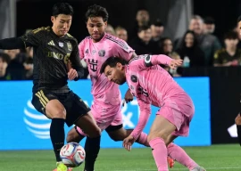 lafc s south korean forward son heung min took on inter miami s argentine great lionel messi photo afp