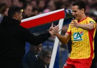 florian thauvin celebrates a goal with lens coach pierre sage photo afp file