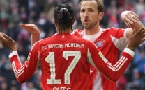 kane shines as bayern sink union