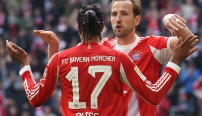 bayern munich forward harry kane r and winger michael olise both grabbed goals in saturday s win over union berlin photo afp
