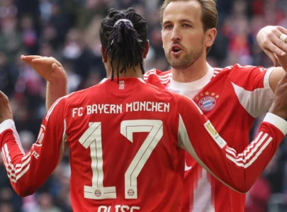 kane shines as bayern sink union