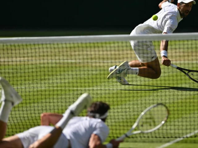 novak djokovic dives for a winner against the floored arthur rinderknech at wimbledon photo afp novak djokovic dives for a winner against the floored arthur rinderknech at wimbledon photo afp