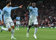 manchester city s jeremy doku celebrates after scoring their second goal during the premier league match against liverpool at anfield on sunday photo afp