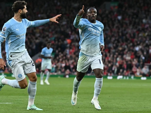 manchester city s jeremy doku celebrates after scoring their second goal during the premier league match against liverpool at anfield on sunday photo afp manchester city s jeremy doku celebrates after scoring their second goal during the premier league match against liverpool at anfield on sunday photo afp