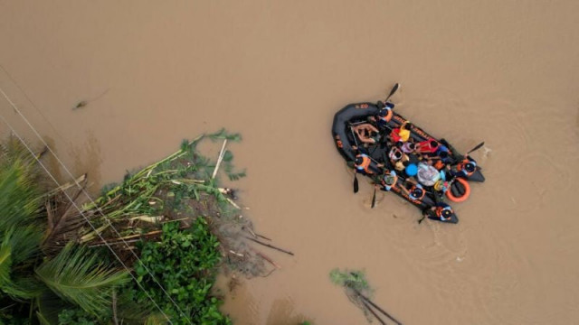 tropical storm trami has turned streets in the philippines into rivers photo afp tropical storm trami has turned streets in the philippines into rivers photo afp