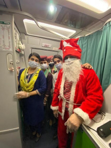 pia gives christmas gifts to passengers