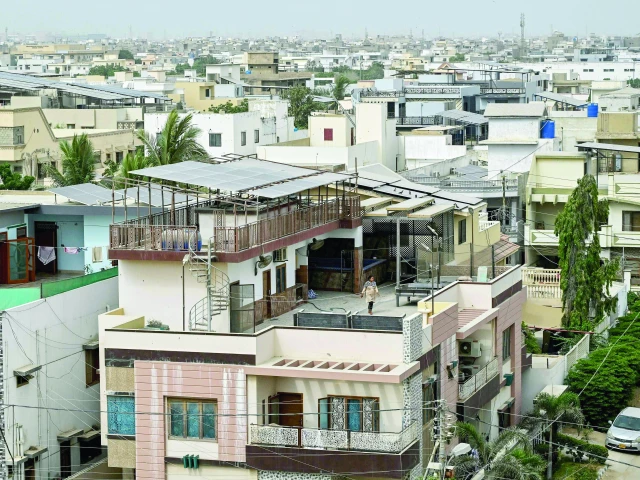 solar panels are now seen installed on the rooftops of houses across the country photo afp solar panels are now seen installed on the rooftops of houses across the country photo afp