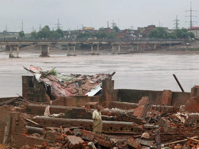 a man inspects the remains of a damaged property after water levels receded along the right bank of the ravi river in lahore pakistan august 31 2025 photo reuters a man inspects the remains of a damaged property after water levels receded along the right bank of the ravi river in lahore pakistan august 31 2025 photo reuters