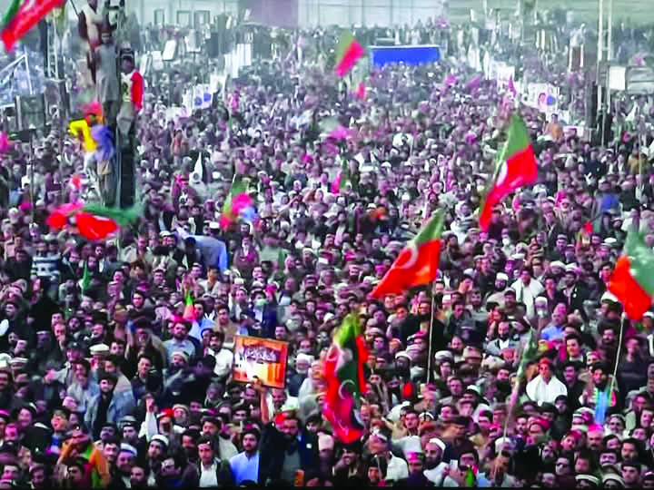 people attend a pti rally taken out in swabi to protest against alleged rigging in the last year s elections photo express