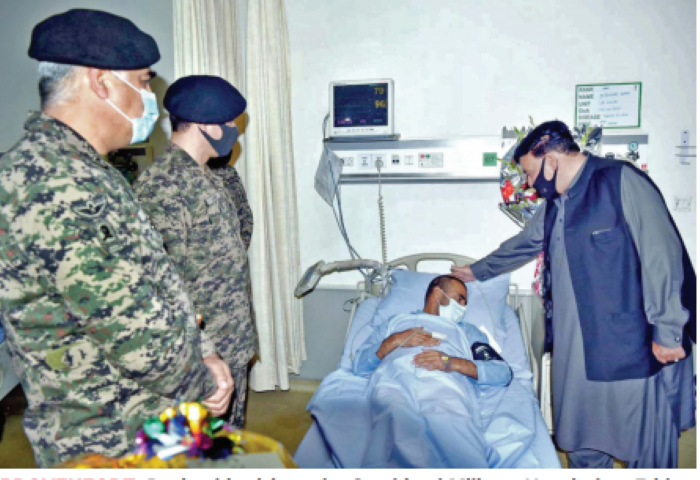 braveheart during his visit to the combined military hospital on friday interior minister sheikh rashid inquires after the health of an officer injured in a clash with violent protesters earlier in the week