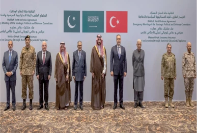 pose for a photograph during a committee meeting in riyadh photo reuters