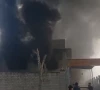 thick plumes of smoke billow from a textile factory that caught fire in rawalpindi s industrial estate on february 9 photo screengrab
