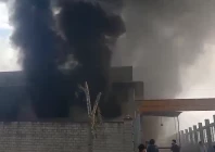 thick plumes of smoke billow from a textile factory that caught fire in rawalpindi s industrial estate on february 9 photo screengrab