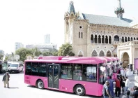 safe ride the women only pink bus fleet is parked at frere hall during the inauguration ceremony while women enjoy a free ride on the first day of the service photo agencies express