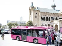 safe ride the women only pink bus fleet is parked at frere hall during the inauguration ceremony while women enjoy a free ride on the first day of the service photo agencies express