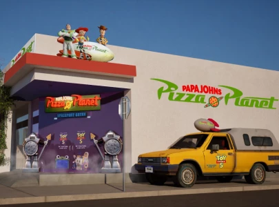 toy story 5 pizza planet pop ups coming to papa johns in global disney collaboration