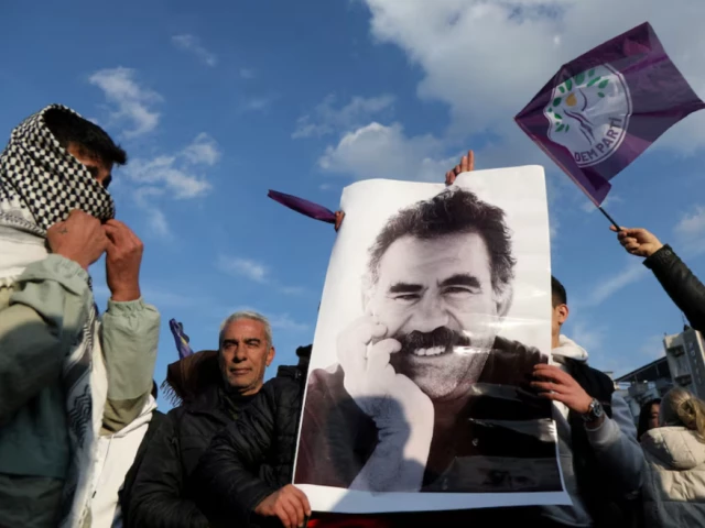 a demonstrator holds a picture of jailed kurdish militant leader abdullah ocalan during a rally in diyarbakir turkey february 27 2025 photo reuters a demonstrator holds a picture of jailed kurdish militant leader abdullah ocalan during a rally in diyarbakir turkey february 27 2025 photo reuters