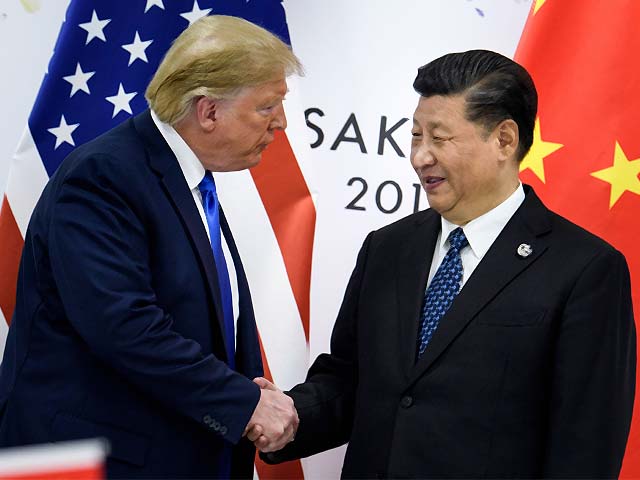 xi jinping shakes hands with donald trump photo afp