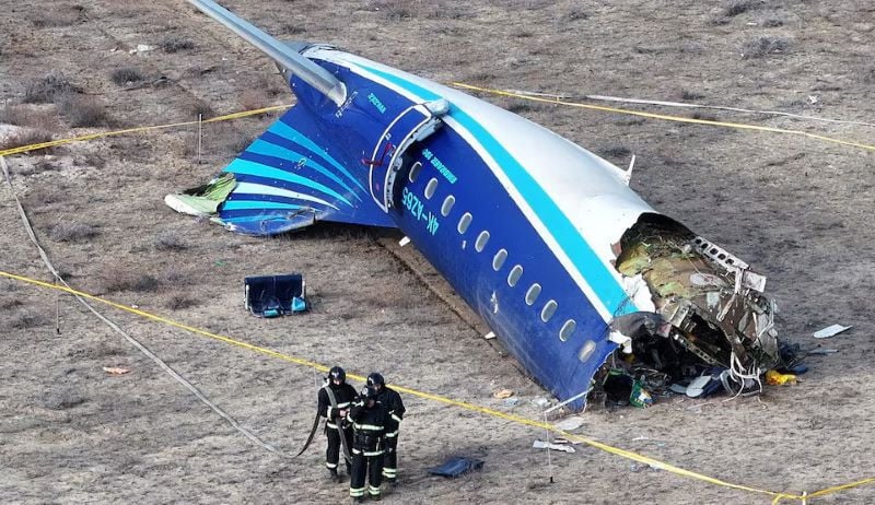 a drone view shows emergency specialists working at the crash site of an azerbaijan airlines passenger plane near the city of aktau kazakhstan december 25 2024 photo reuters