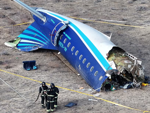 a drone view shows emergency specialists working at the crash site of an azerbaijan airlines passenger plane near the city of aktau kazakhstan december 25 2024 photo reuters