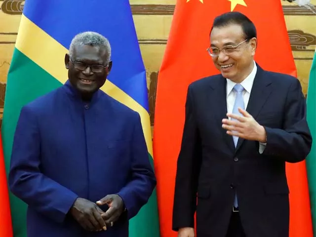 solomon islands prime minister manasseh sogavare and chinese premier li keqiang attend a ceremony photo afp solomon islands prime minister manasseh sogavare and chinese premier li keqiang attend a ceremony photo afp